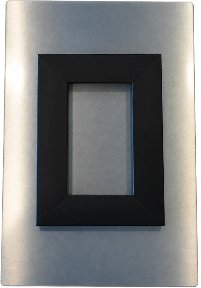 The back of an aluminum print: a black float mount, pre-installed and ready to hang.